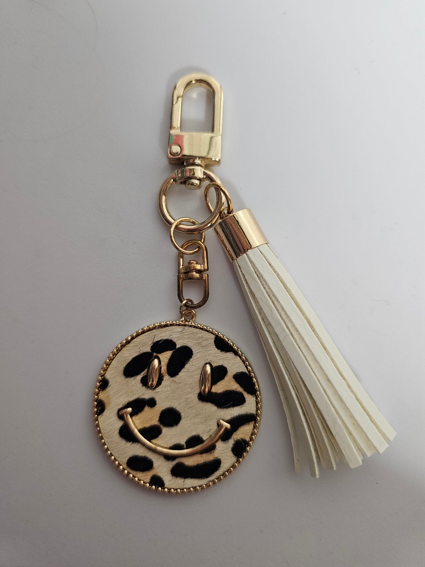 Animal Print Smiley Face Coin Keychain w/white tassel