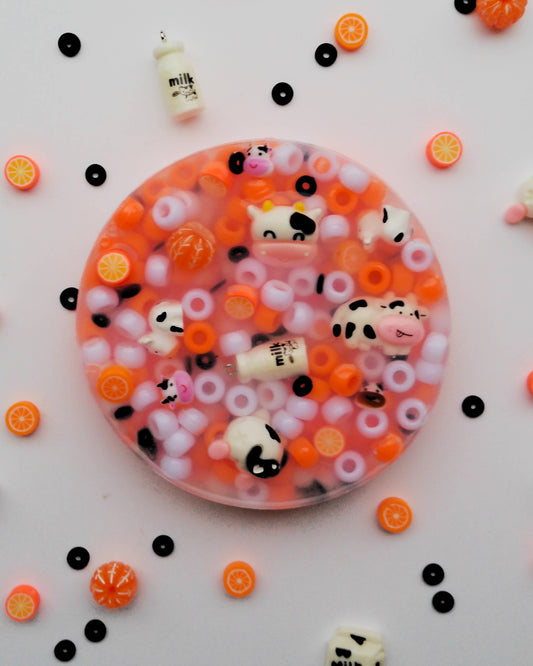 Orange Moo-sicle Picking Pad Fidget Toy